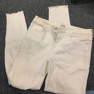 White Sneak Peek Skinny Jeans
